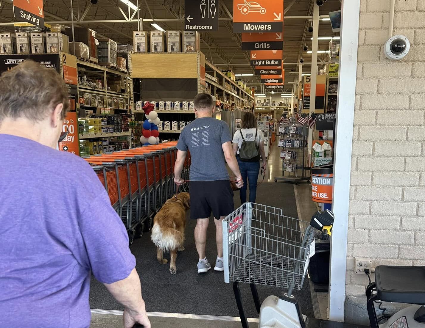 Dog and owner practicing distraction in home depot